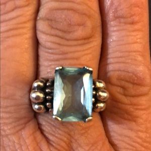 .925 ring with light blue stone